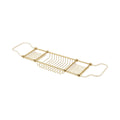 Gold metal bath caddy on a white background