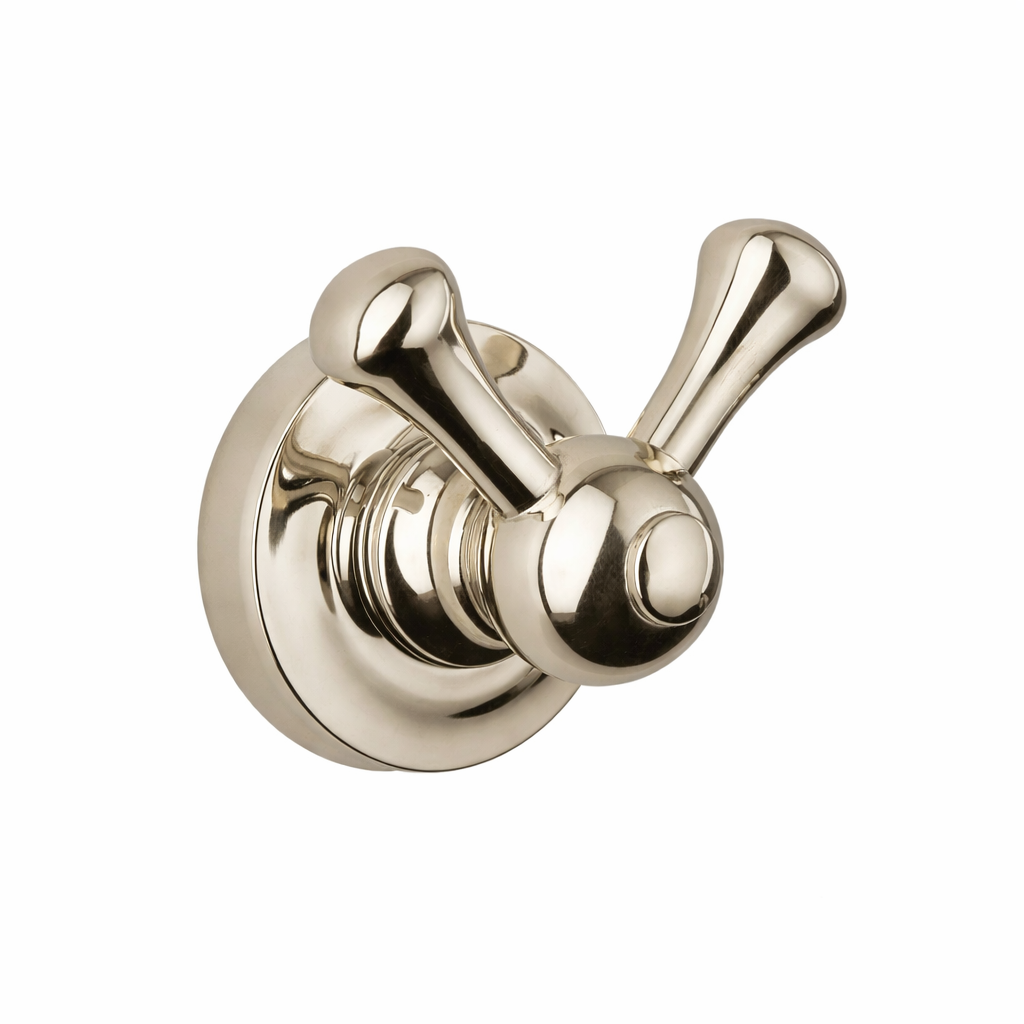 Polished brass double robe hook on a white background