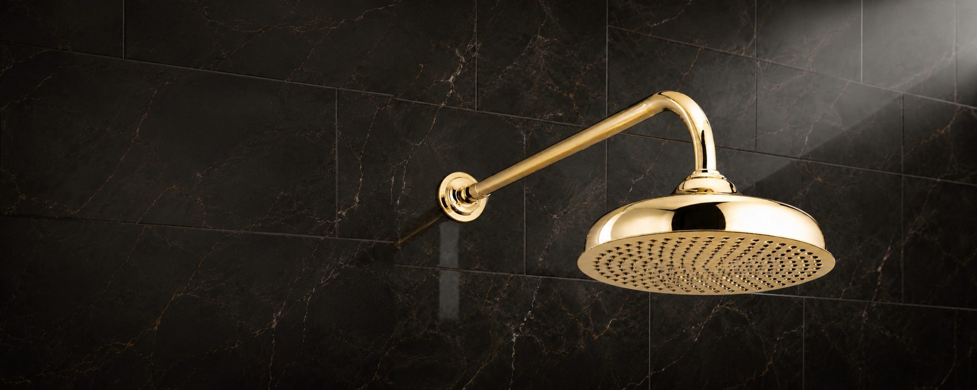 Solid brass shower head and brass bathroom fittings handcrafted in the UK