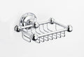 Chrome wall-mounted soap dish on a white background